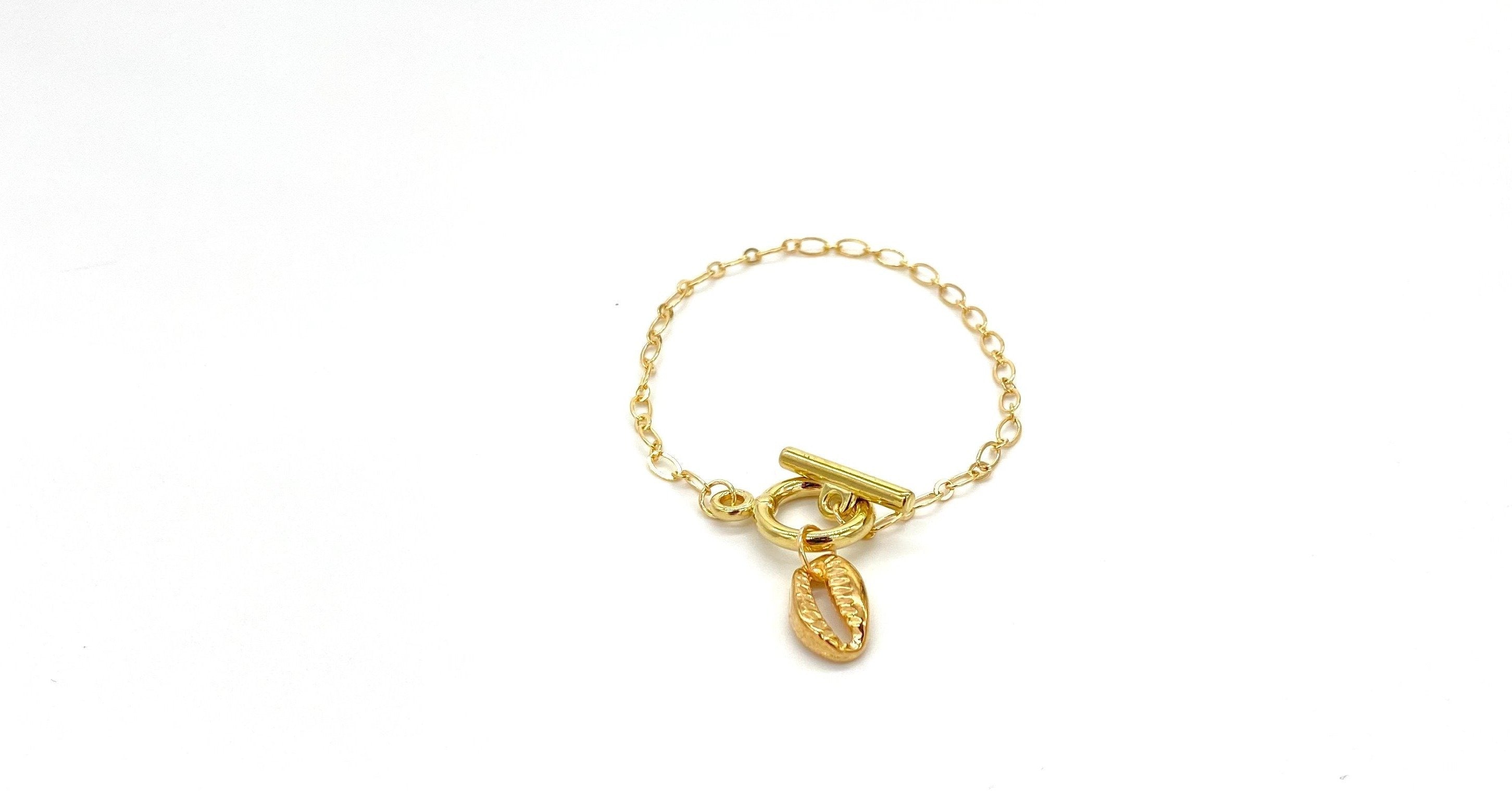 Ivory B: Golden Cowry Bracelet