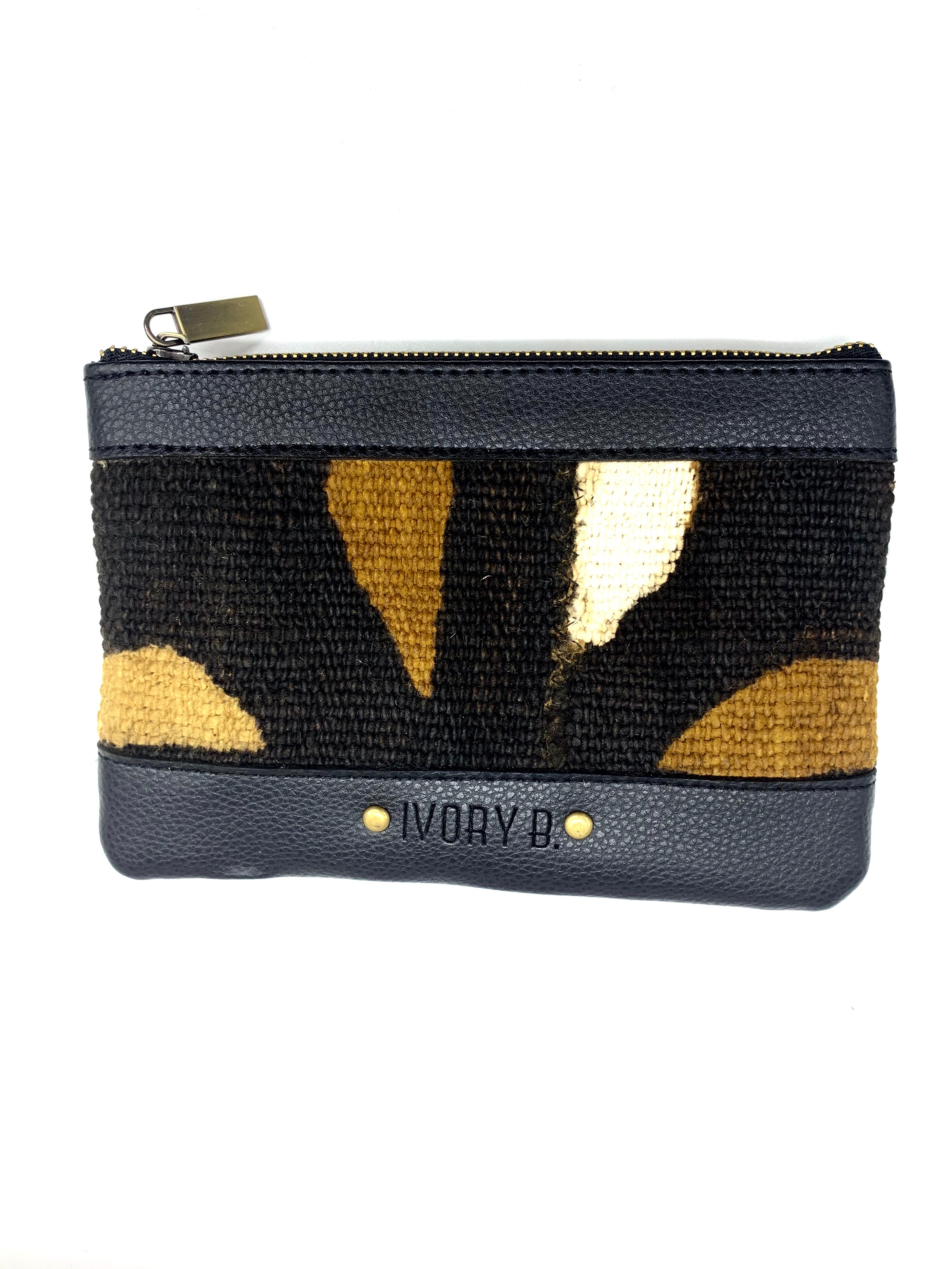 Ivory. B front: Issa Pouch Black Tradi 